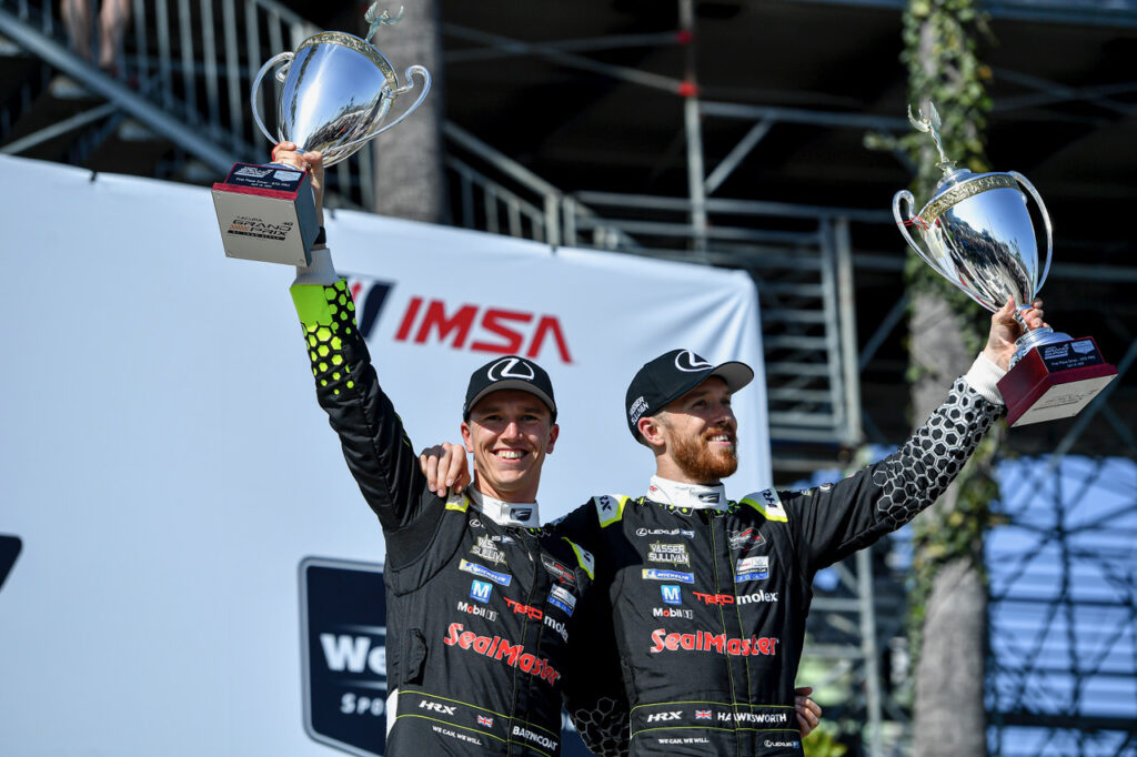 Ben Barnicoat on the podium with his trophy at Long Beach